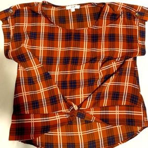 Checkered print plunging twist front blouse